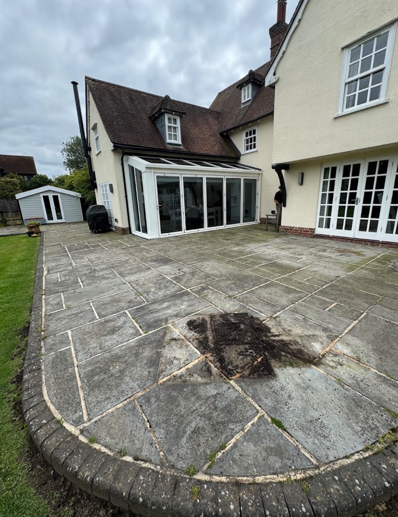 Brick path before exterior cleaning